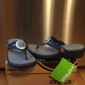 NWT- Crocs navy/ smoke flip flop